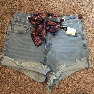 Light wash denim shorts with ribbon belt